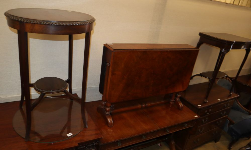 A Victorian walnut Sutherland table, W.90cm, D.16cm, H.64cm together with an Edwardian circular occasional table